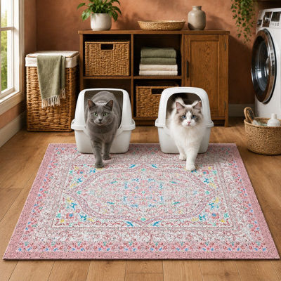 A washable 33 x 22 in litter trapping mat with thick PVC coil construction that catches scatter; the surface is soft on paws, while a non-slip design and waterproof bottom help protect floors.