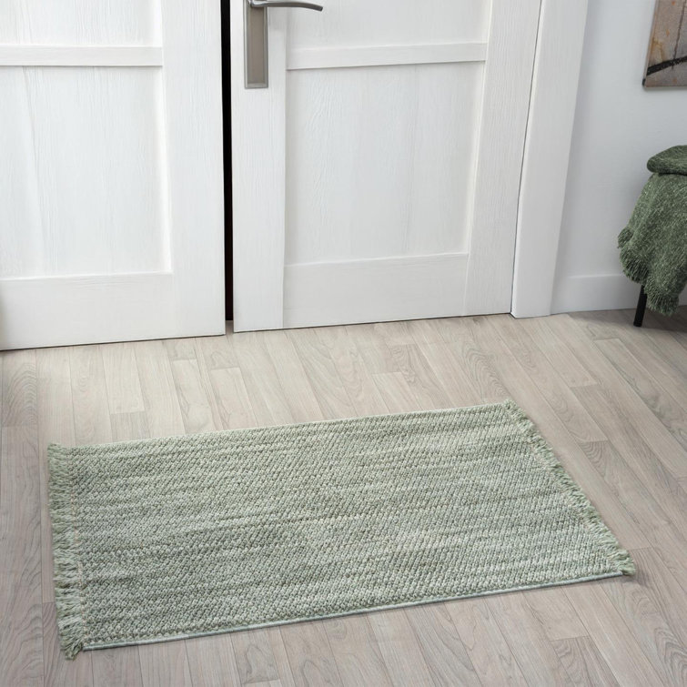 Tapis texturé à franges