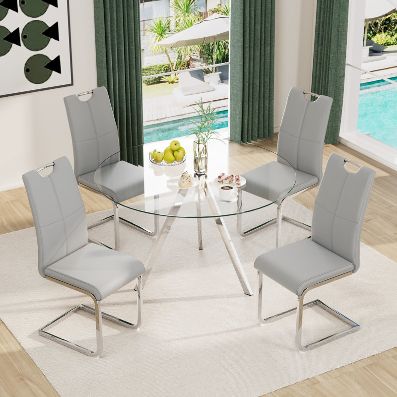 Ensemble de table de salle à manger en métal et verre avec 4 chaises rembourrées en similicuir, Gris