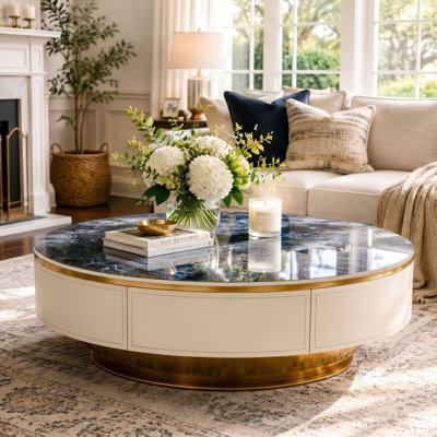 Table basse ovale moderne pré-assemblée, plateau en saphir de 51,18 po avec armoire en similicuir crème et base dorée, table basse luxueuse avec rangement à tiroir caché pour le salon