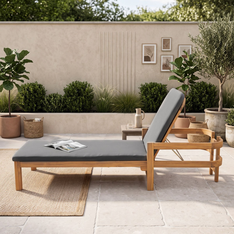 Chaise longue d'extérieur moderne en bois d'acacia avec dossier réglable et coussin résistant aux intempéries