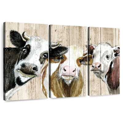 Curieux vaches sur bois