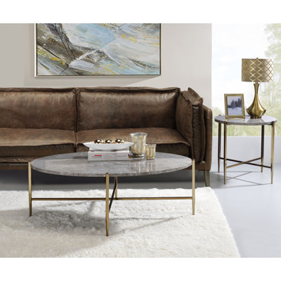 Table de bout chic gris et champagne avec amplement d'espace pour le salon