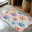 Tapis tressé avec pattes éclaboussées et peinture-106464304