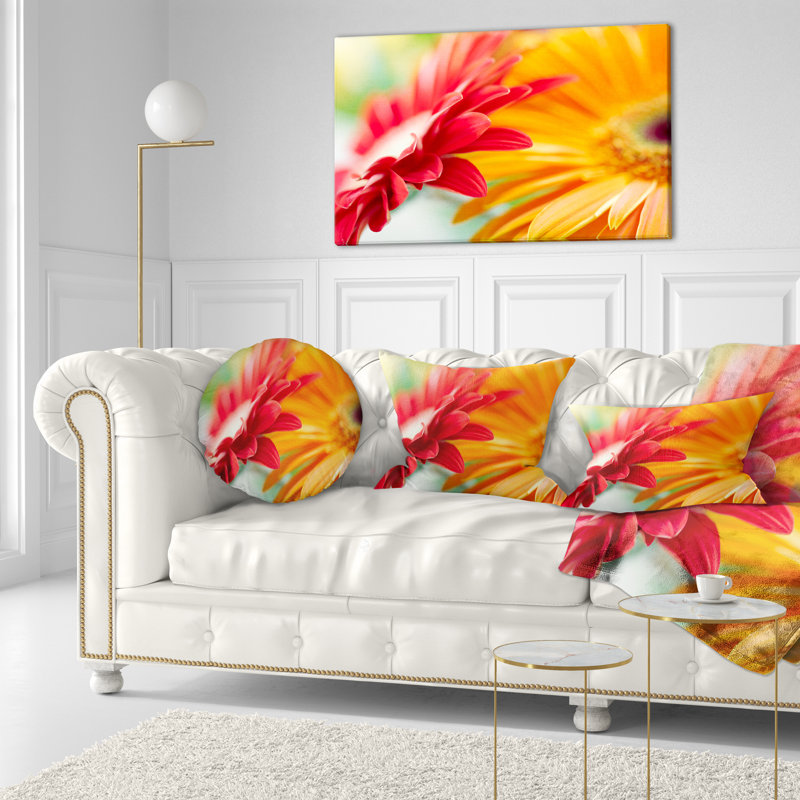 Coussin décoratif à imprimé floral rouge et jaune