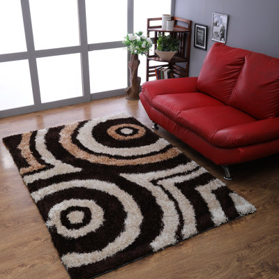 Tapis à poils longs en polyester touffeté à la main Aaliyah