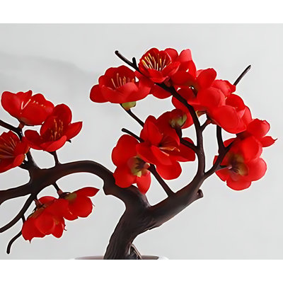 Arrangement de fleurs de prunier en pot