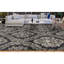 Tapis noir et doré de haute qualité noué à la main