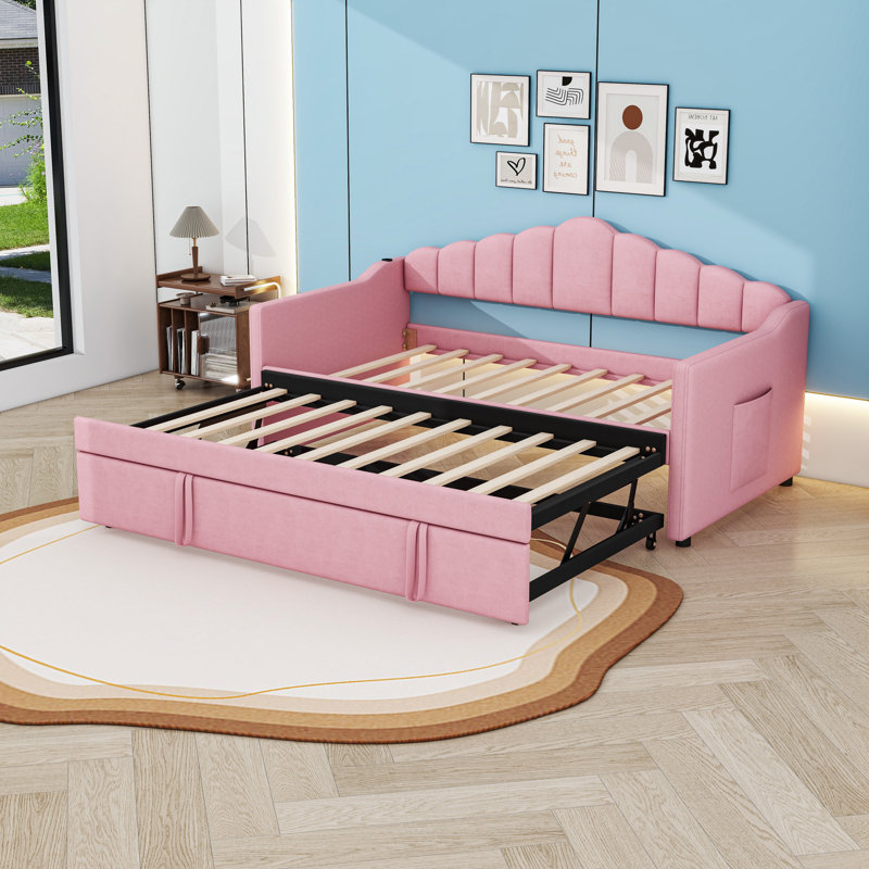 Twin Size Upholstered Daybed with Twin Trundle, Charging Station and Side Pockets, Pink