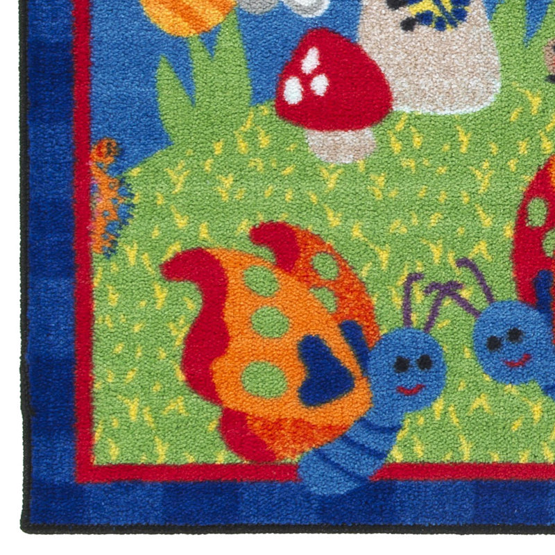 Tapis vert/bleu Touffetant McCollum