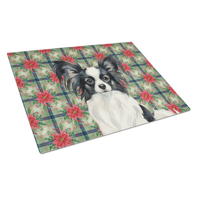 Black and White Papillon Christmas PoinsettIas Glass Cutting Board