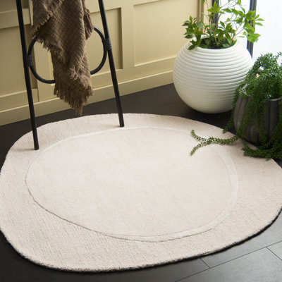 Novelty Hand Tufted Wool Viscose Solid Colour Rug in Ivory