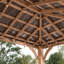 Abri de jardin extérieur en bois de cèdre 14 pi x 10 pi avec toit en acier galvanisé et PowerPort Backyard Discovery Barrington