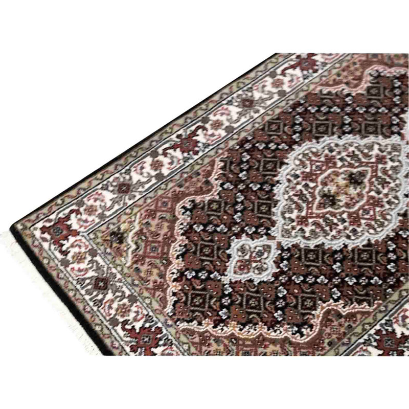 Hand Knotted Area Rug in Black And Cream
