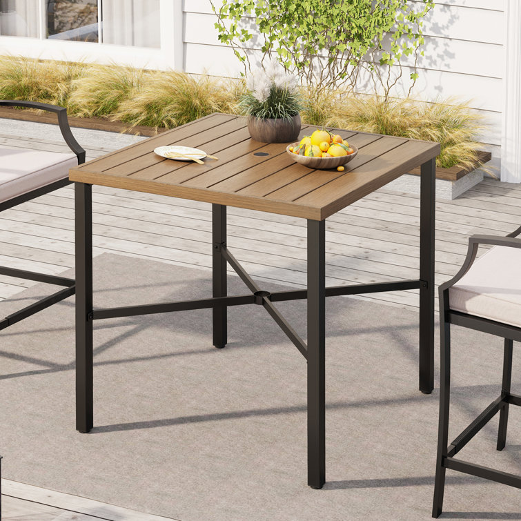 bar height patio table with umbrella 2 chairs Paradise 30" Square Outdoor Counter High Bistro Hole Foldable chairs with sling fabric seat and curved arms provide convenience and comfort Bar Height Patio Table With