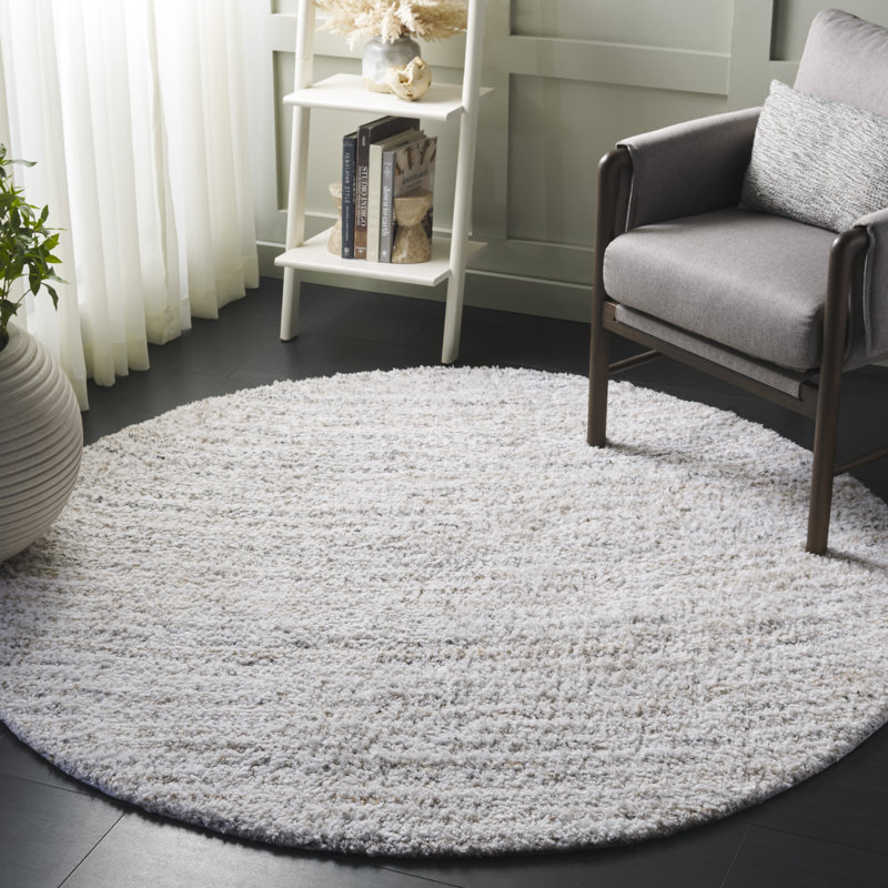 Tapis ivoire / beige en polyester tissé à la main à motif abstrait Algie, Rond 6 pi