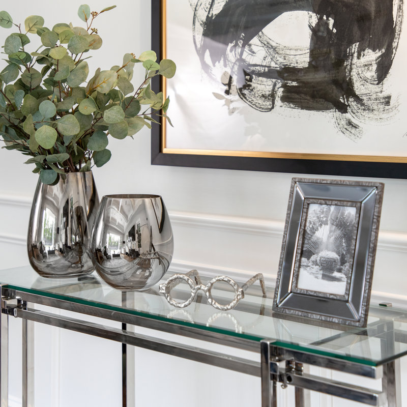 Decorative Glass Vase Glass High-Shine Glam Accent with Modern Curved Silhouette and Sleek Reflective Surface for Contemporary Interior Style Display.