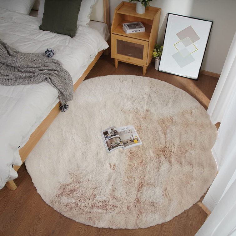 Ruther Solid Color Machine Woven Faux Fur Area Rug in Beige
