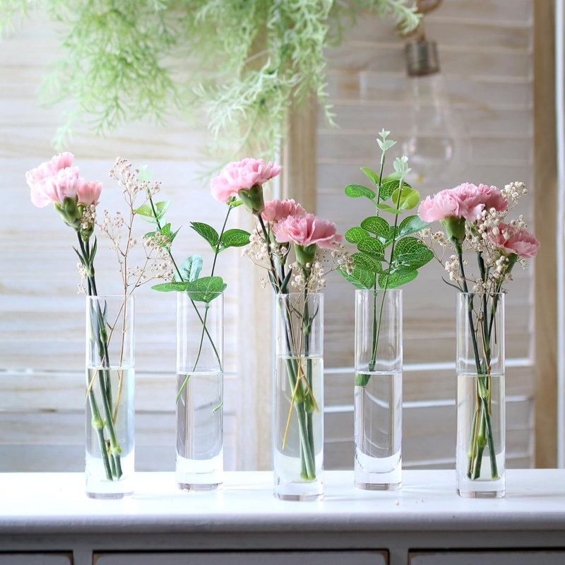 Ensemble de 12 vases en verre