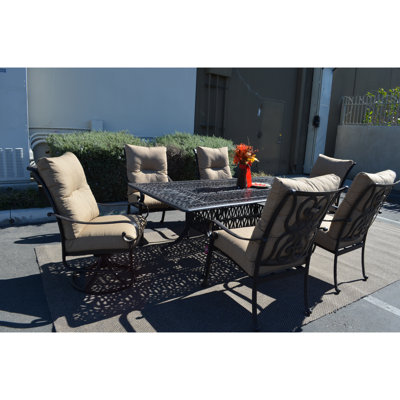 Poulsbo Rectangular 6 - Person 87" Long Aluminum Dining Set with Cushions by Fleur De Lis Living