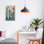 Giclée encadrée de fleurs de cactus vibrantes sur fond rose, design par LSR Design Studio