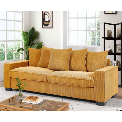 Canapé moelleux confortable et luxueux avec de nombreux coussins supplémentaires, parfait pour les moments de détente en famille et les moments de détente