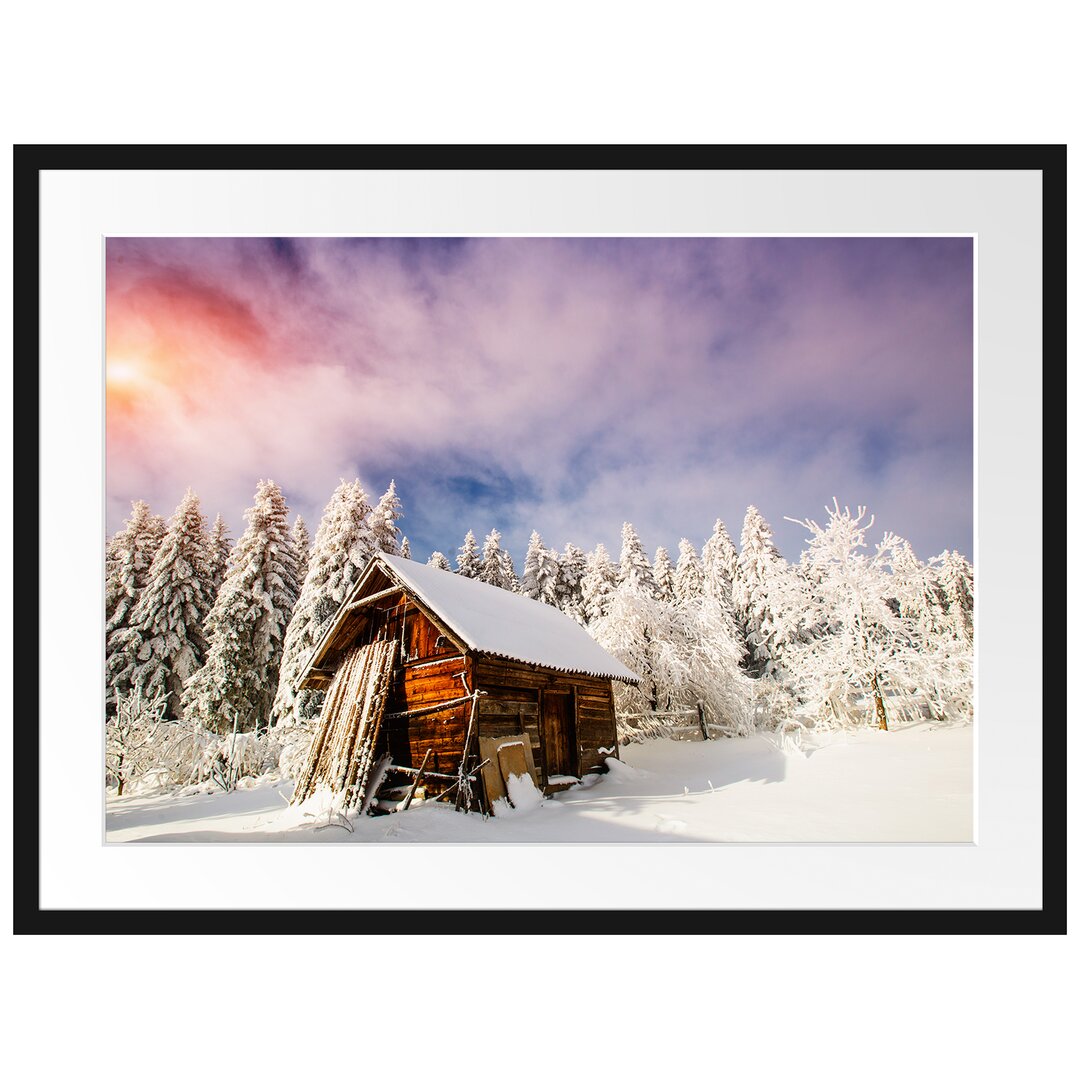 Gerahmtes Poster Holzhütte im Schnee