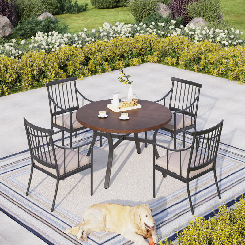 4 - Person Patio Dining Set with Round Table , Cushions Included