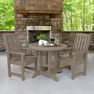 Arbnora 4 - Person Patio Dining Set with Round Table