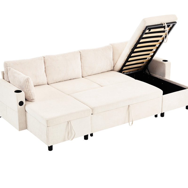 Lit modulaire beige avec rangement et confort. 111,8 po de long, 4 ports, porte-gobelets. Caractéristiques pratiques en chenille et velours côtelé. Rangement,