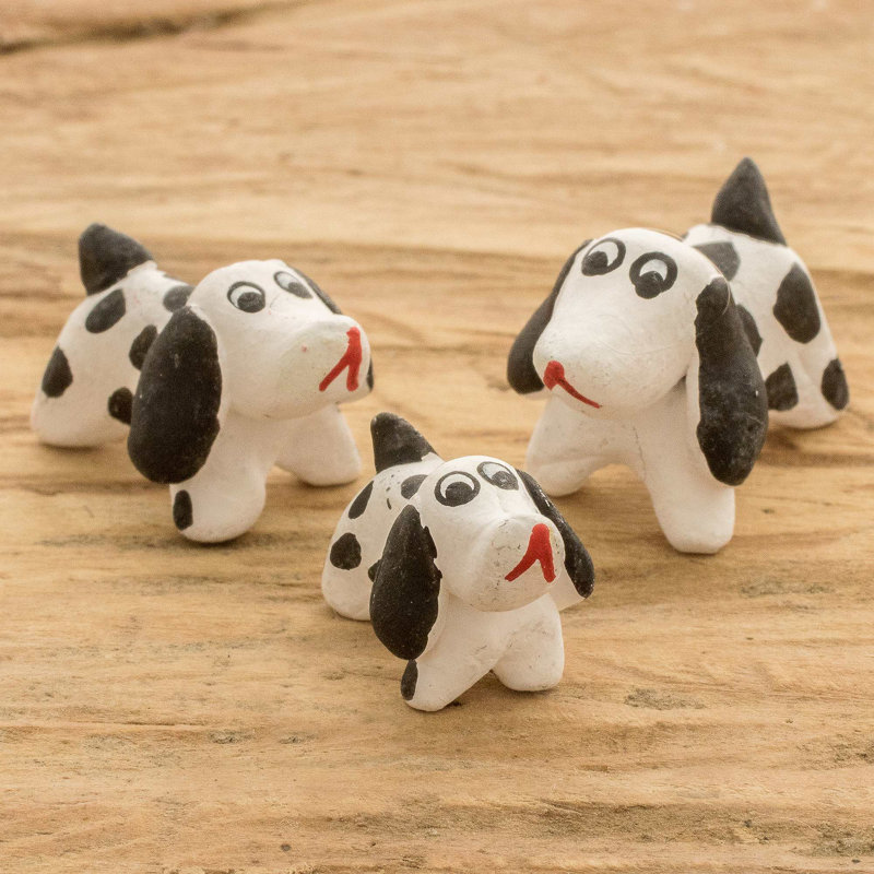 Figurines en céramique fabriquées à la main de la famille dalmatienne