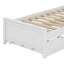 Lit plateforme en bois avec tête de lit et lit gigogne