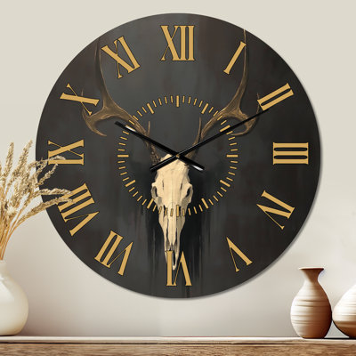 Horloge murale ronde en métal blanc avec accent doré