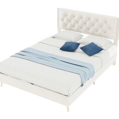Lit double, beige, structure de lit tapissier, bois de peuplier, revêtement en velours, lit douillet, structure bien conçue, retraite personnelle, tête de lit, lecture, détente, remplacement facile du matelas