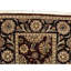 Manchuria Wool Oriental Area Rug in Black/Wine