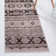 Tapis brun à motif géométrique