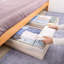 Organisateur de vêtements sous le lit