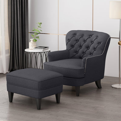 Fauteuil club spacieux avec housse grise, pieds en bouleau stables, tissu contemporain, structure