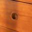 Commode d'appoint arrondie avec pattes en acier inoxydable