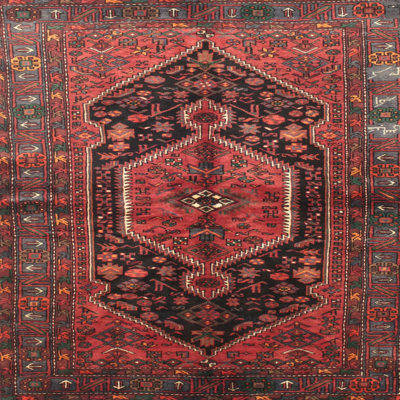 Tapis rouge à motif sud-ouest