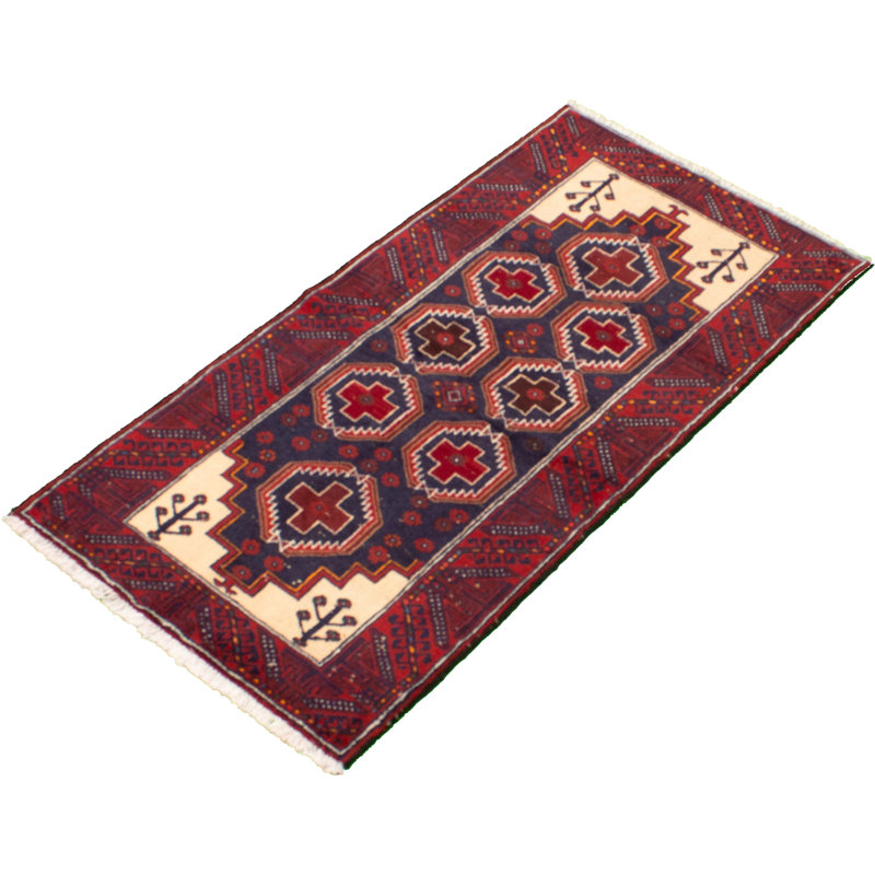 Tapis rouge en laine noué à la main