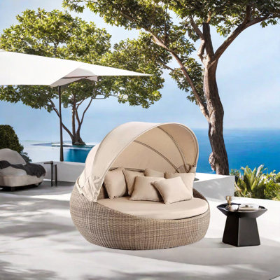 Rattan courtyard patio daybed 55.12 " W Patio Daybed with Cushions