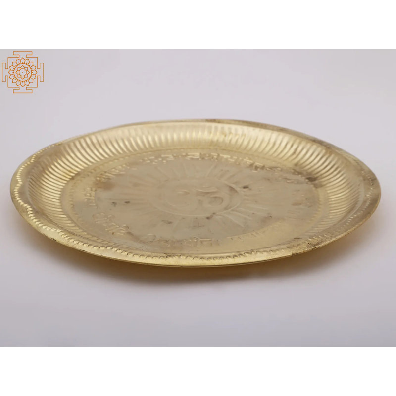 Assiette décorative ronde en métal dorée