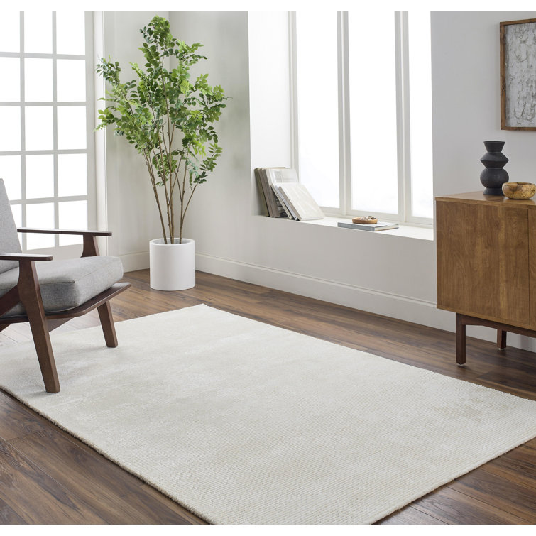 Bryann Solid Color Hand Tufted Viscose/Wool Area Rug in Cream