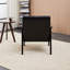 Fauteuil d'appoint en cuir avec pieds robustes en bois