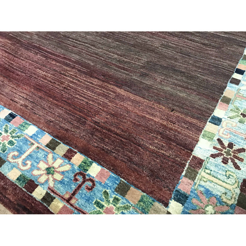 Tapis bleu clair et vin de haute qualité noué à la main