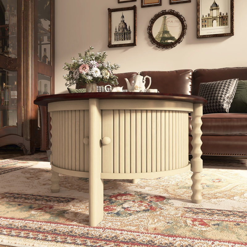 Table basse ronde avec porte coulissante