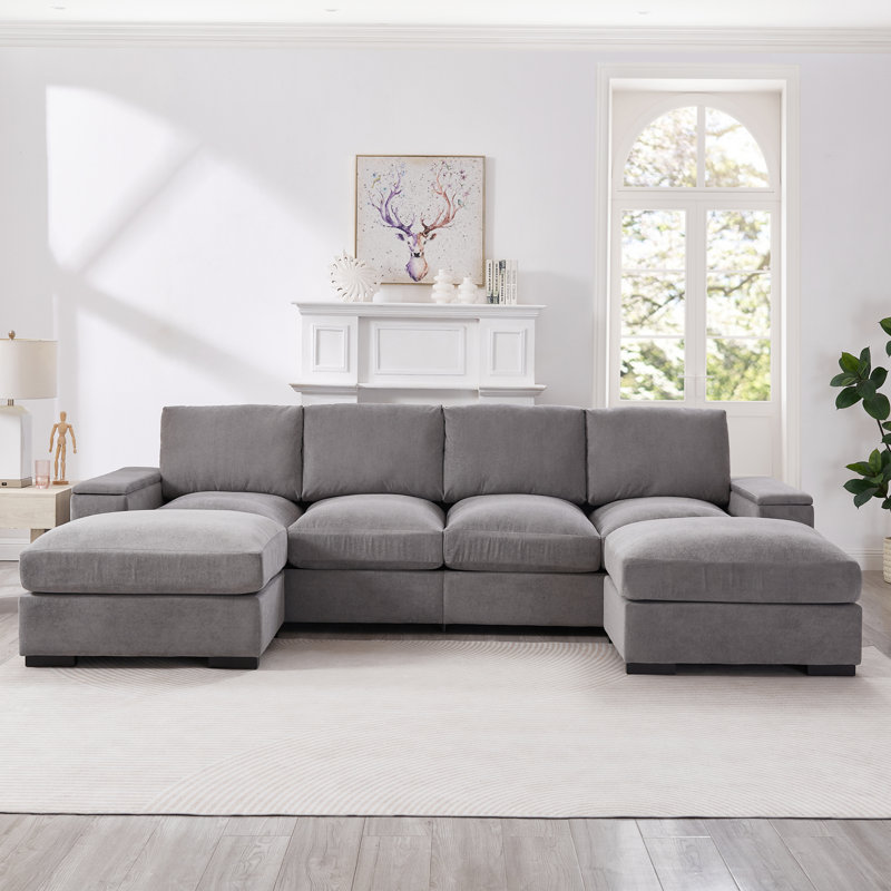 Canapé modulaire avec sièges profonds et repose-pieds amovibles, revêtement en velours côtelé pour un confort et une polyvalence maximaux dans les salons et les bureaux