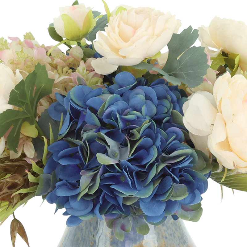 Hydrangea and Ranunculus Arranged in Decorative Vase