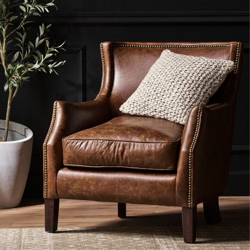 Fauteuil en cuir confortable avec accoudoirs confortables en cuir brun